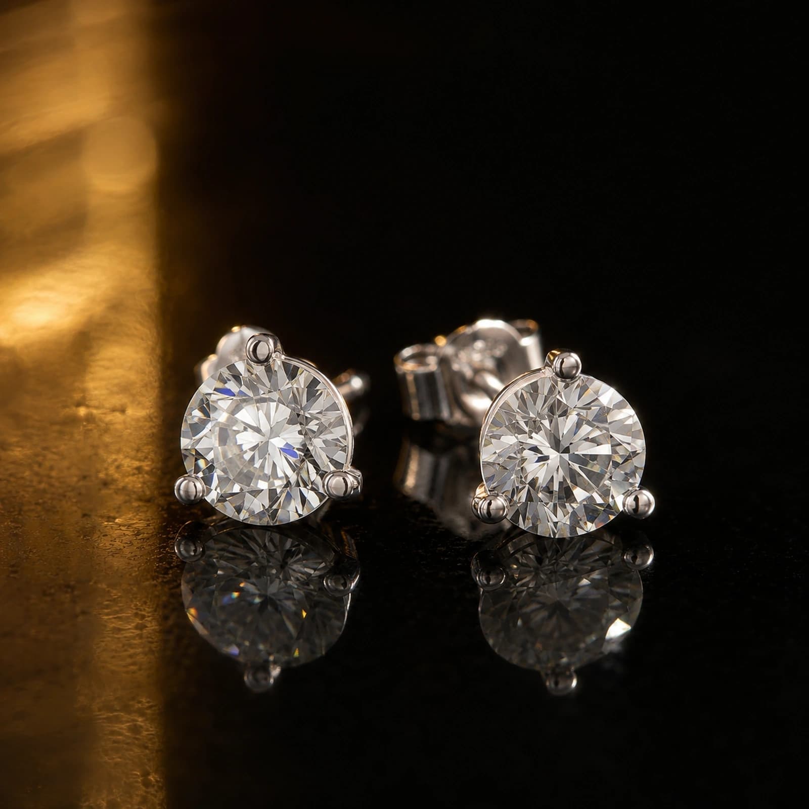 Martini stud earrings 1.00 ct total in white gold on a dark luxury background