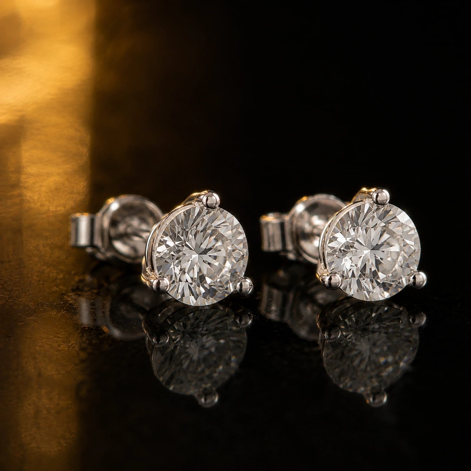 Martini stud earrings 1.00 ct total in white gold, angled product view